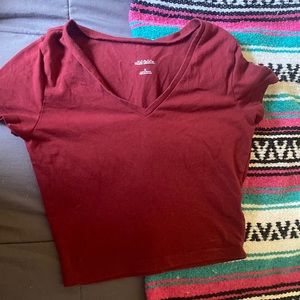 Crop top, v-neck, maroon.